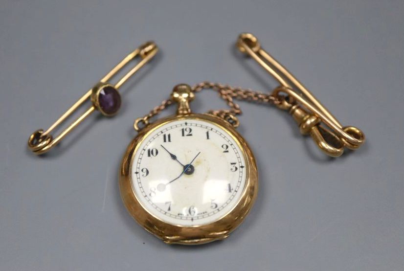 A George V 15ct gold fob watch, on chain with pin, gros 22.4 grams, and a yellow metal and gem set bar brooch,